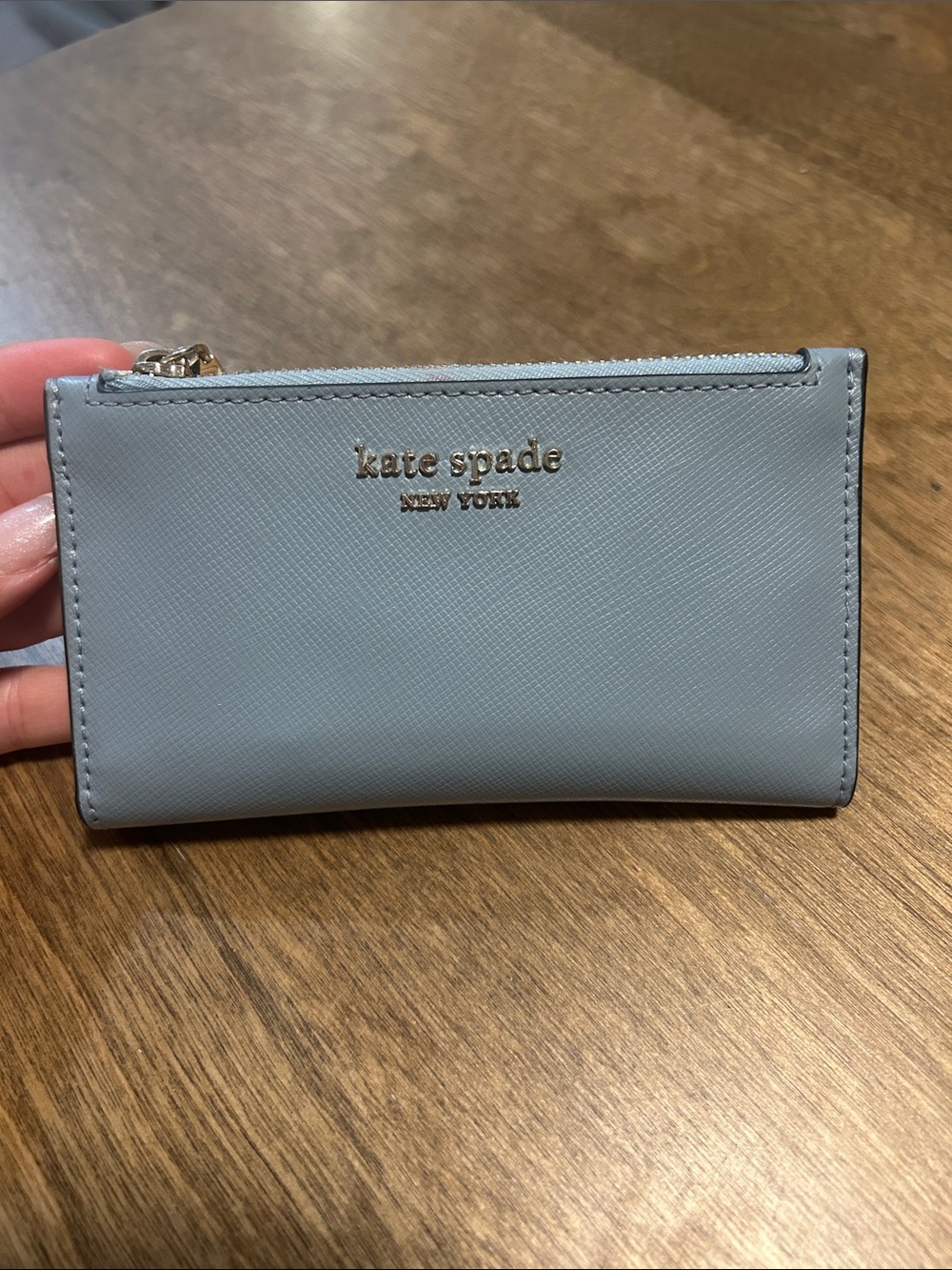 kate spade light blue saffiano zip card case with gold logo